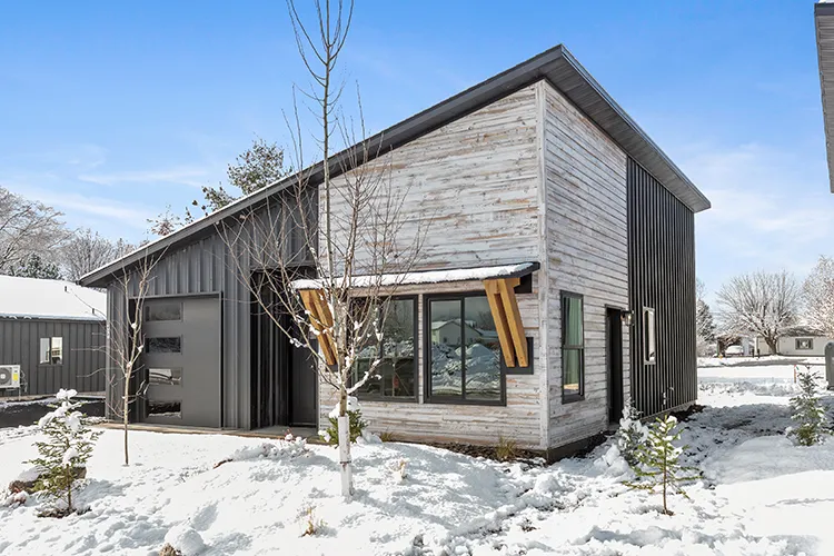A Home from kit culture with stunning wood-look panels in this winter scene