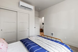 A multi zone ductless head is seen inside this kit culture kit home bedroom