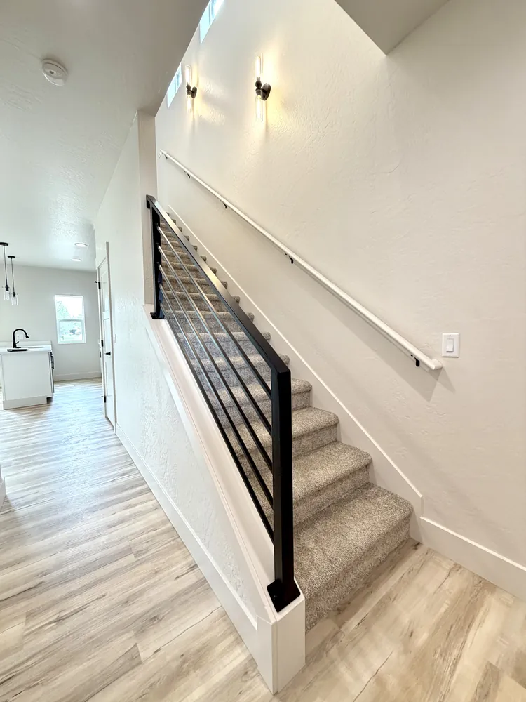 Interior staircase of a two-story family-size kit home