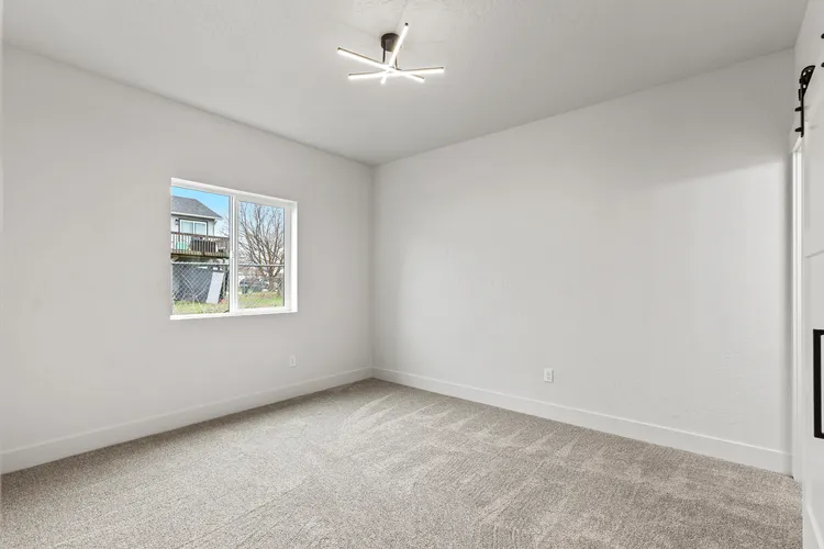 Bedroom with the ductless heat pump Washington State's energy code requires