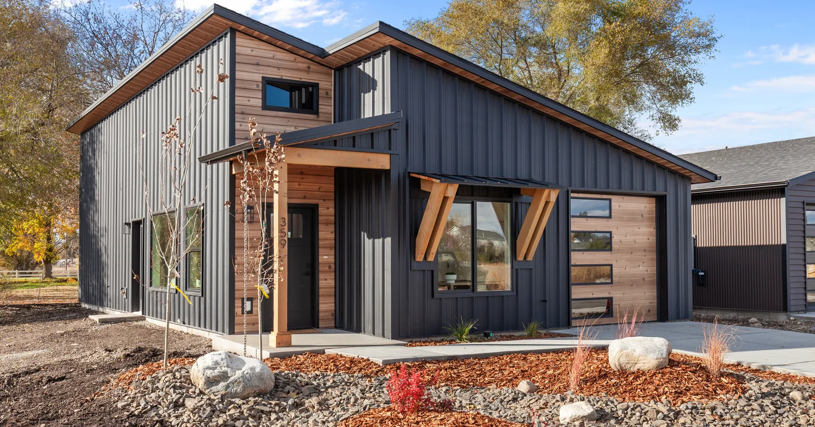 Prefab home for Washington builds from Kit Culture, black metal and wood siding