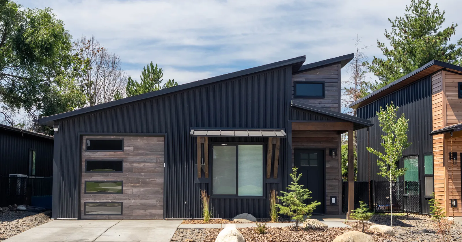 Modern prefab home in Washington State with metal and wood siding
