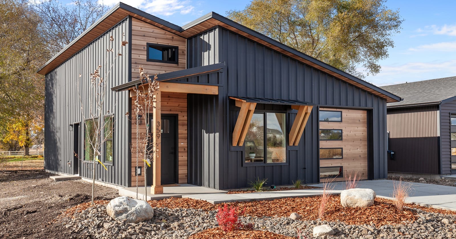 Modern Kit Culture home with smooth cedar siding, built from one of the home kits sold in Idaho