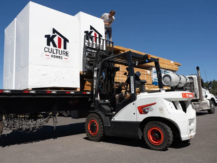 Labeled, precut components in weatherproof boxes, how build a house kits arrive on site