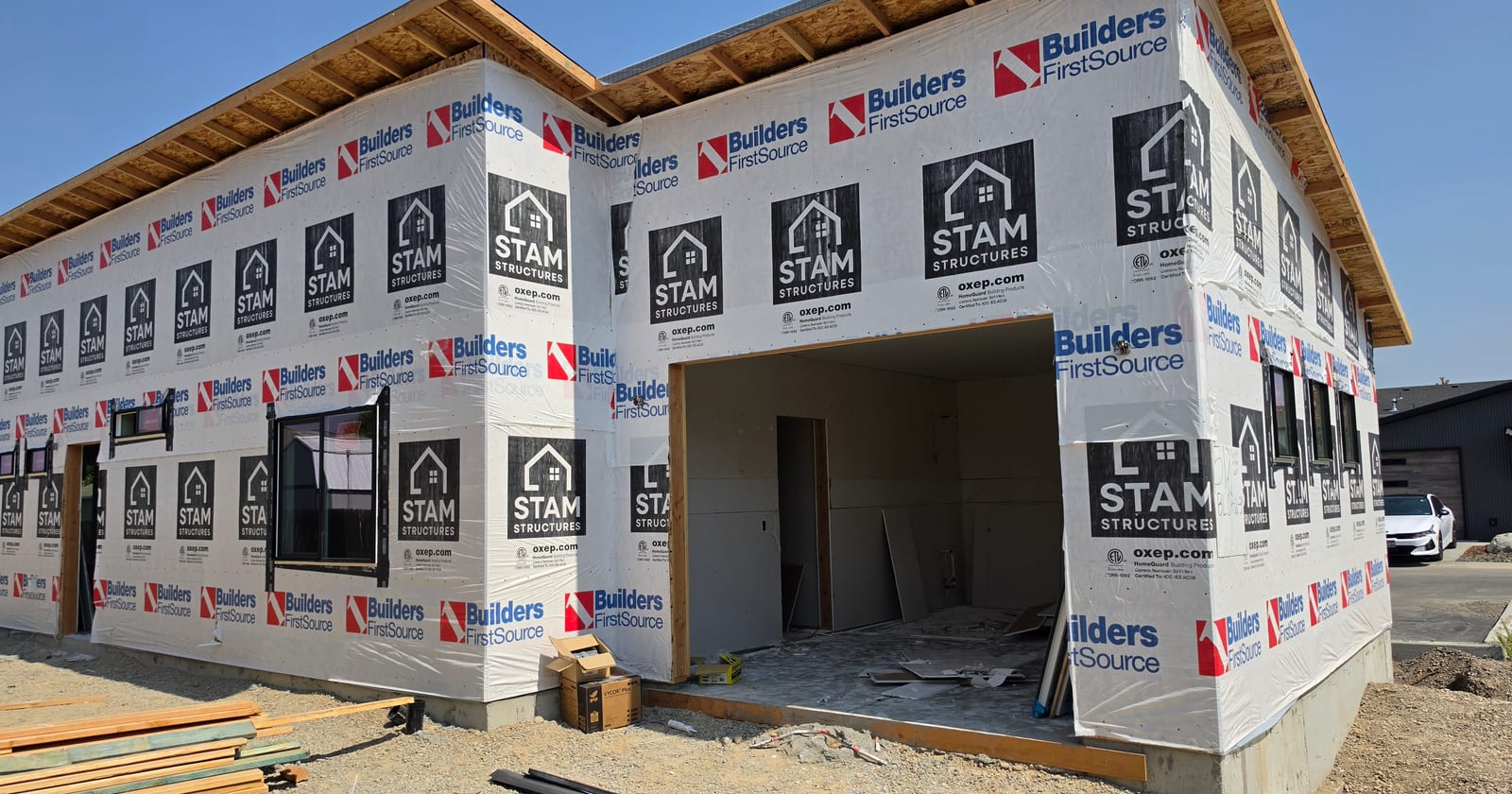 A prefab house kit before siding is installed.
