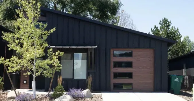 Street of modern kit homes in an Idaho development, an example of prefab homes for sale nearby