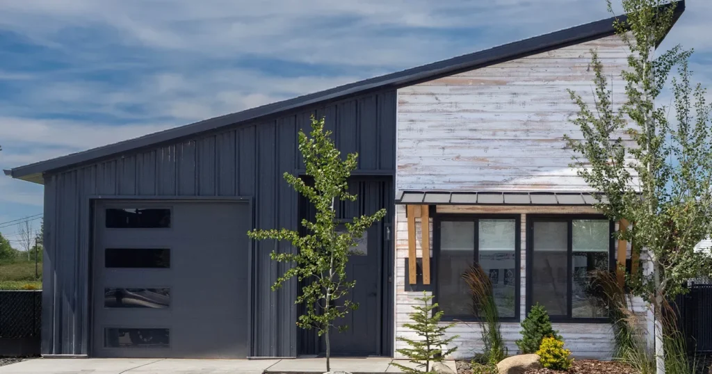 Black and white kit home in Idaho, the finished result that prefab home kits prices only partly cover