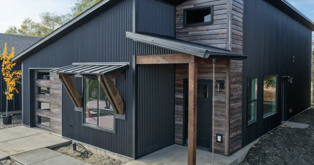 Black exterior of a Kit Culture home, one of the prefab homes built on a permanent foundation in Idaho