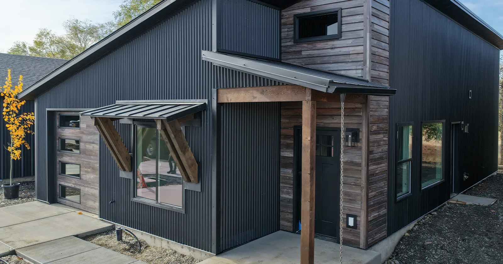 Black exterior of a Kit Culture home, one of the prefab homes built on a permanent foundation in Idaho