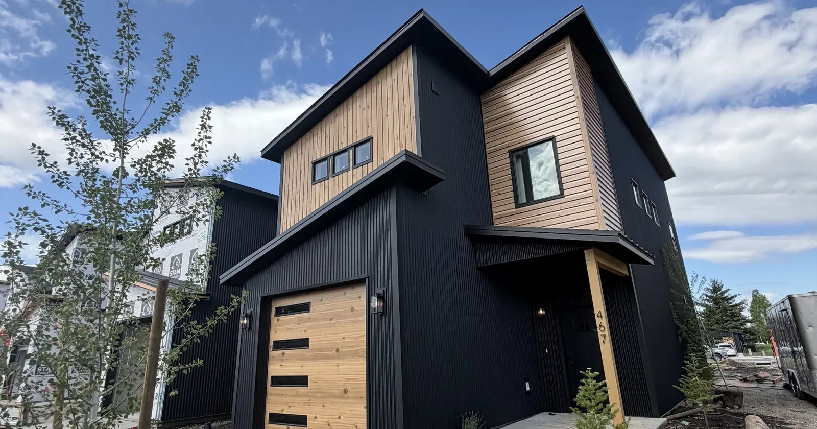 Two-story Family Size kit home exterior, the finished result of one of Kit Culture's prebuilt home kits
